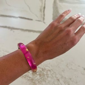 Alexis Bittar hot pink studded lucite bangle.